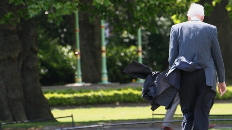 Old man walking in the park